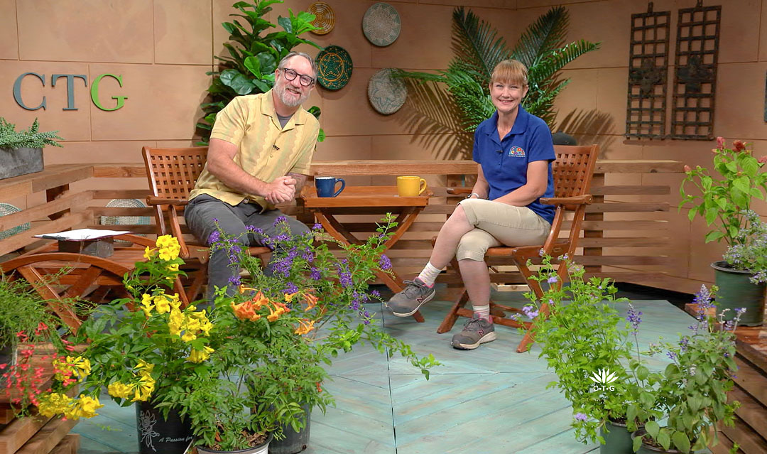 John Hart and Robin on CTG set with lots of plants