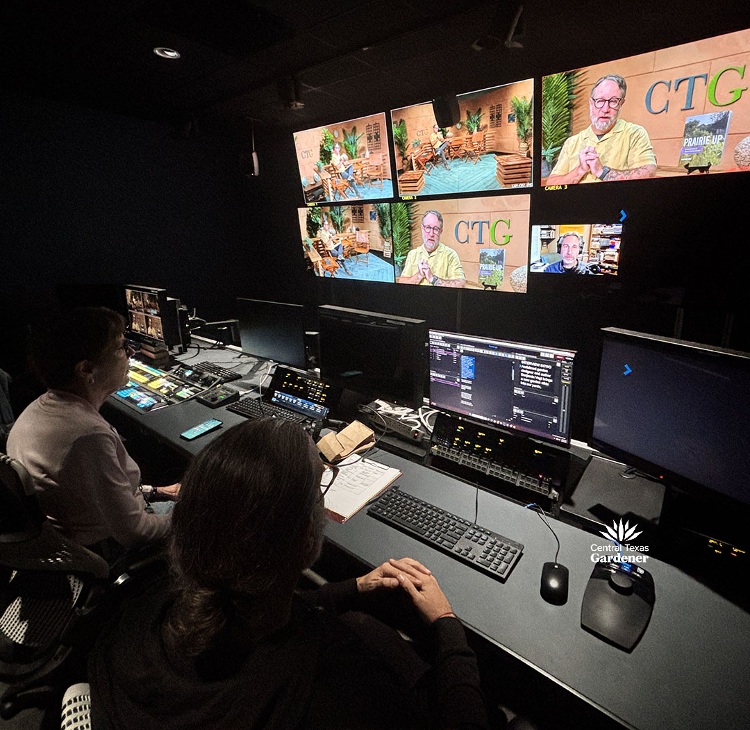 control room with monitors showing John Hart and Benjamin