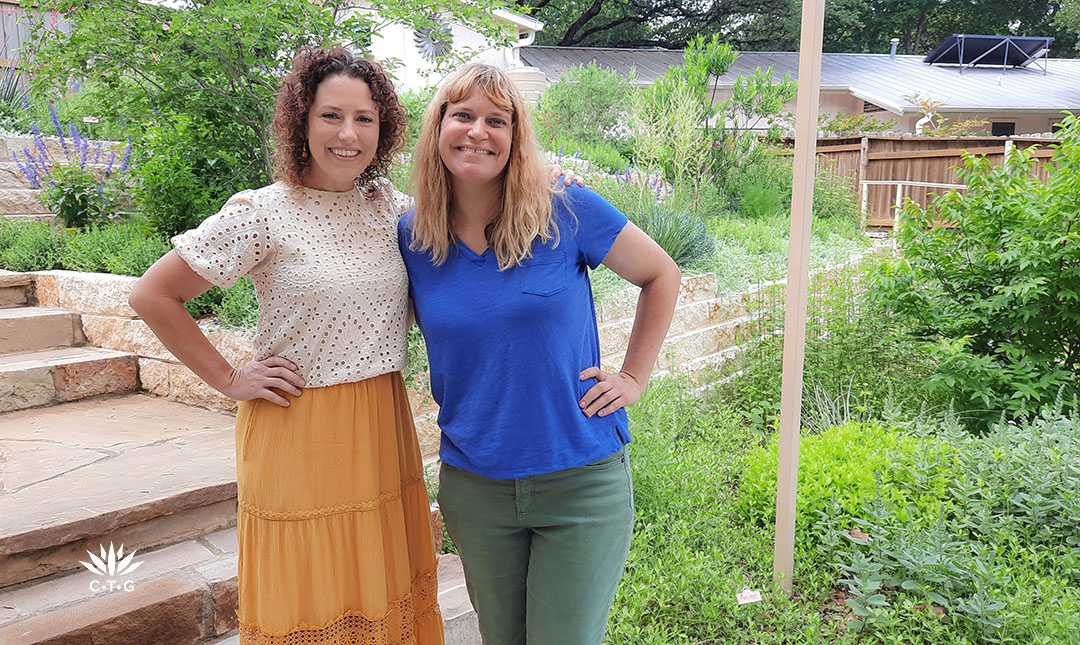 Holly and Leah standing in garden