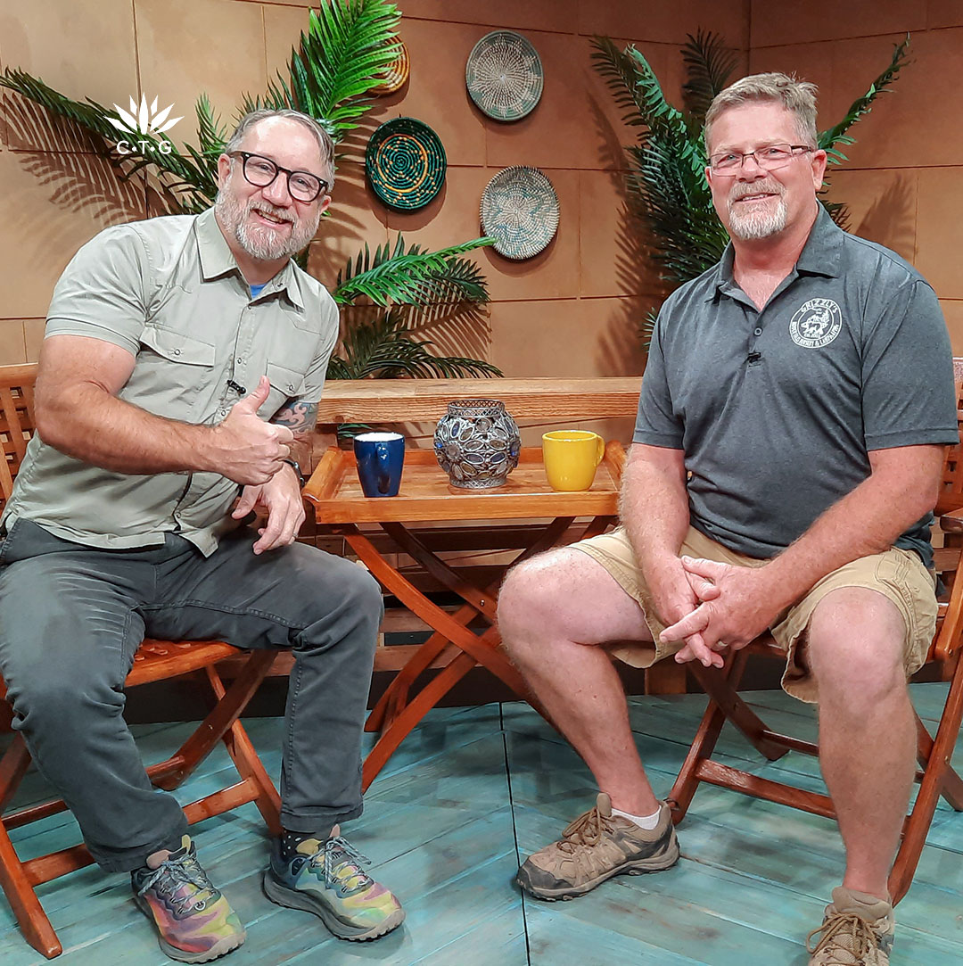 John Hart with smiling man on CTG set